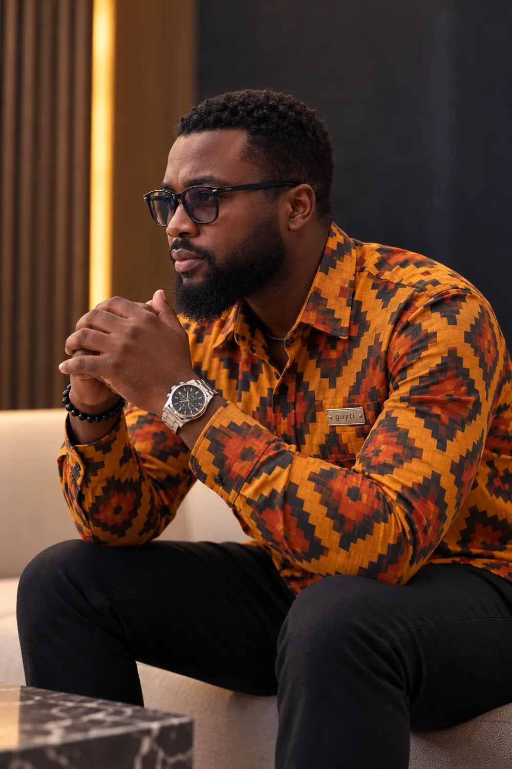 The guyti model in the Saffron Weave Shirt, after dark