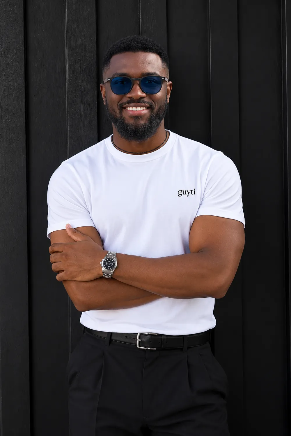 The guyti model in the white Signature Tee, after dark